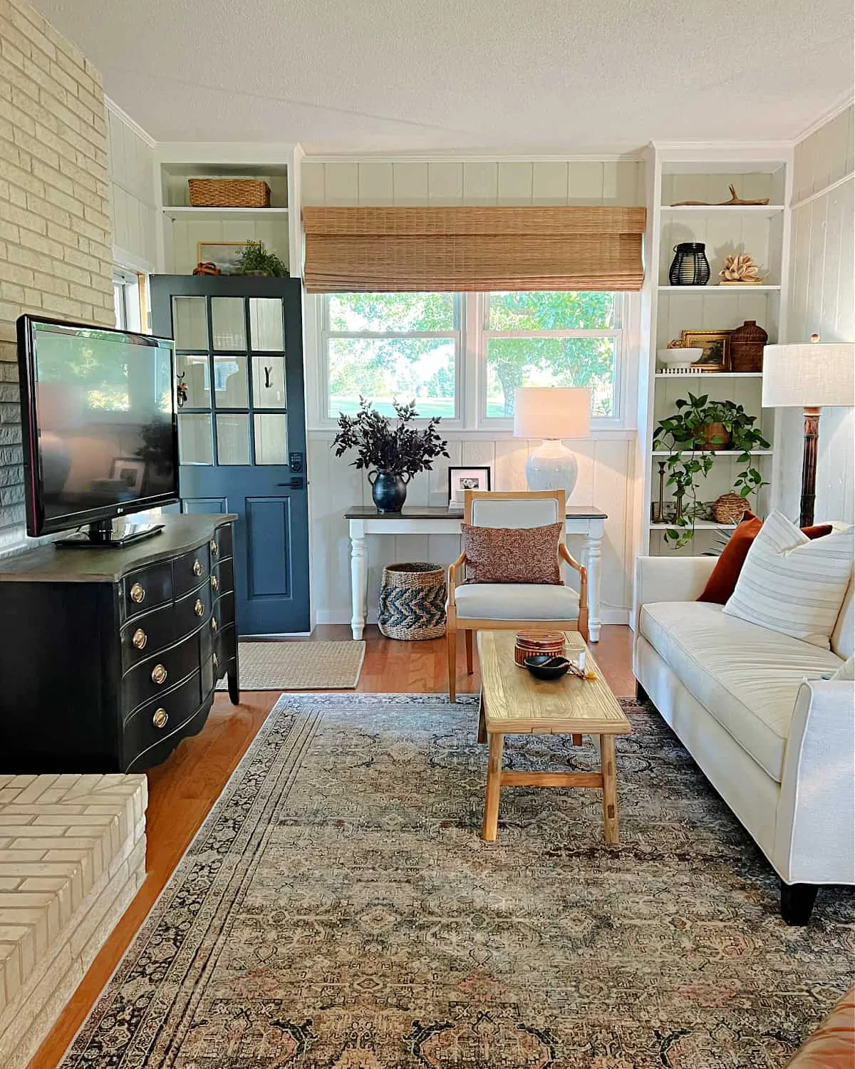 Coffered ceiling and flush light in a narrow living room