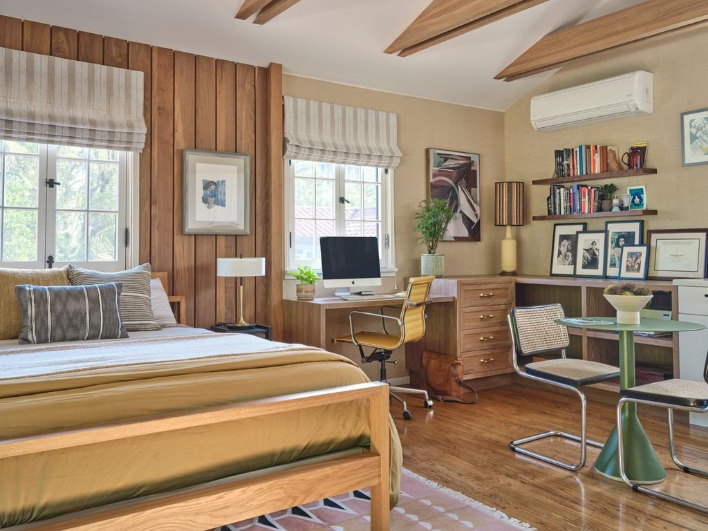 A peaceful and modern guest bedroom designed to welcome visitors with comfort and style.